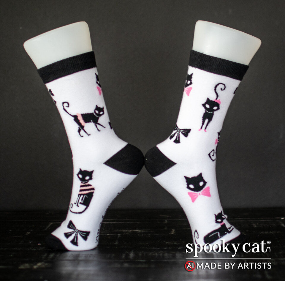 Black Cat Love Socks with bow-wearing black cats in a spooky Valloween sock design on a white background