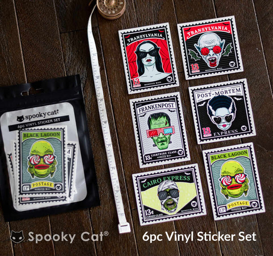 A 6-piece sticker set designed like retro stamps featuring Classic Monster Stickers inspired by Frankenstein, Dracula, and the Creature.