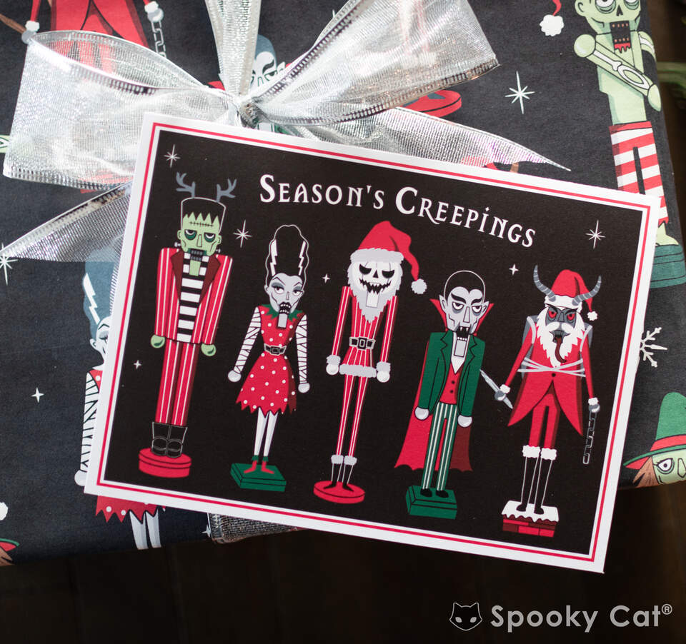 Season’s Creepings card featuring Frankenstein, Bride of Frankenstein, Jack Skellington, Dracula, and Krampus as nutcracker