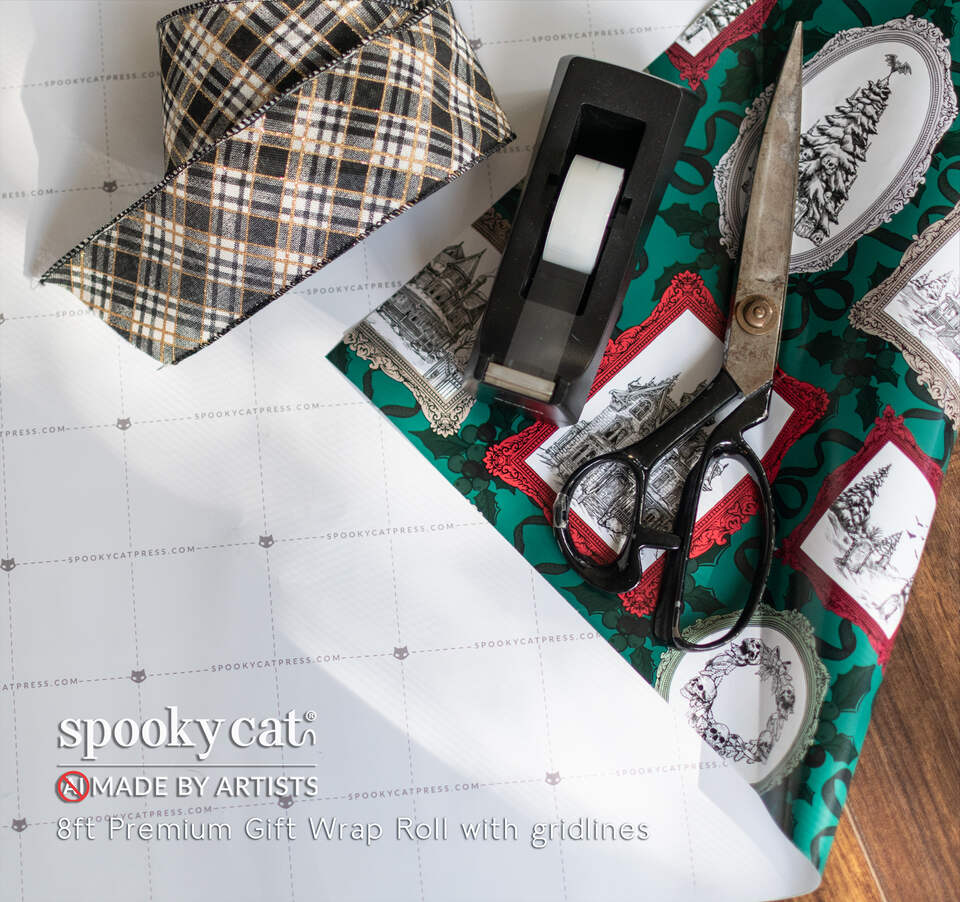 Gothic Victorian Christmas gift wrap roll featuring haunted Victorian houses, snowy graveyards, Christmas trees and ornate picture frames on emerald green, with cutting gridlines on the reverse.