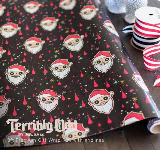 Terribly Odd Santa Orli Creepmas gift wrap featuring a creepy Santa design on black wrapping paper, with cutting gridlines printed on the reverse.