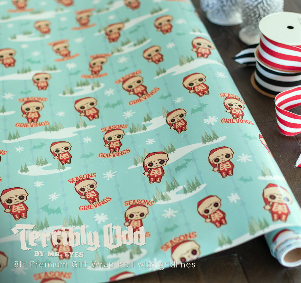 Wesley Creepmas Christmas wrapping paper by artist Michael Reyes featuring a Terribly Odd character in red pajamas, snowflakes and Seasons Grievings text. Officially licensed artwork from Mr. Eyes.