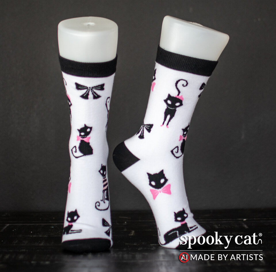 Valloween Black Cat socks showing playful black cat illustrations and bows photographed on mannequin legs